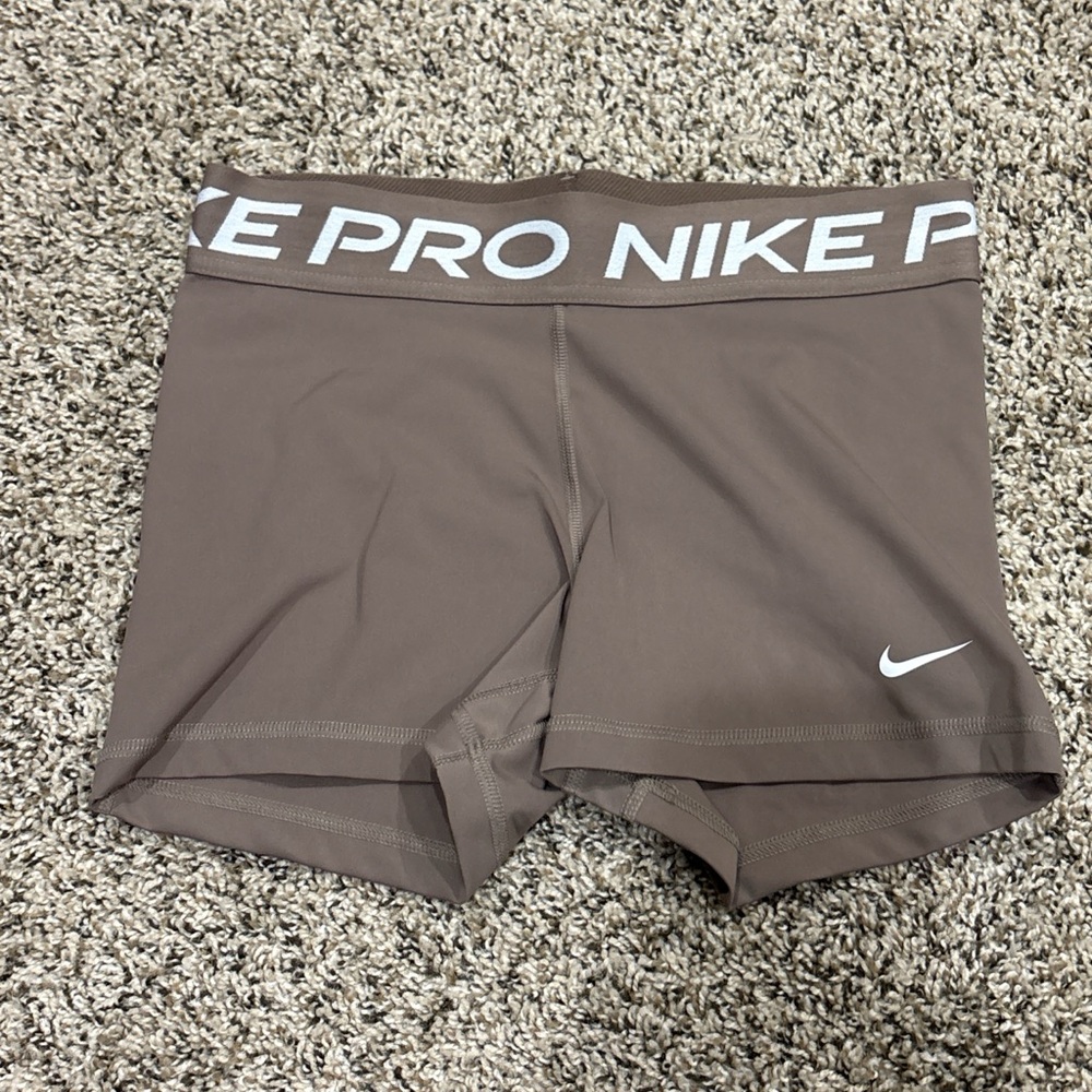 Nike Pro Women's Athletic Shorts in Brown with White Logo